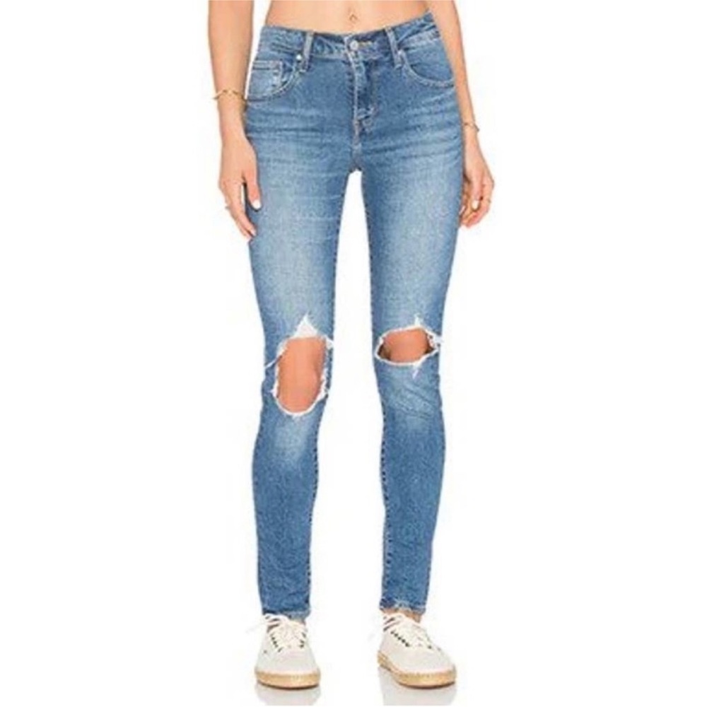 Levis Premium 721 High Rise Distressed Medium
Wash Skinny Jeans - size 28
